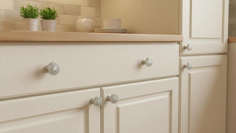 Kick Up Your Cabinet Game With These Premium Brushed Satin Nickel Round Knobs, 10 Pack, Showcasing Delicate Filigree Cutouts For Instant Room Glow And Super Comfortable Daily Handles on kitchen cabinets.