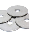 Five stainless steel fender washers with centered holes, overlapping in a small stack
