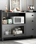 Black kitchen cabinet with a microwave, decor items on top, drawers with Industrial Water Pipe Cabinet Knobs Pulls Set 4 Pieces Iron Retro Industrial Style