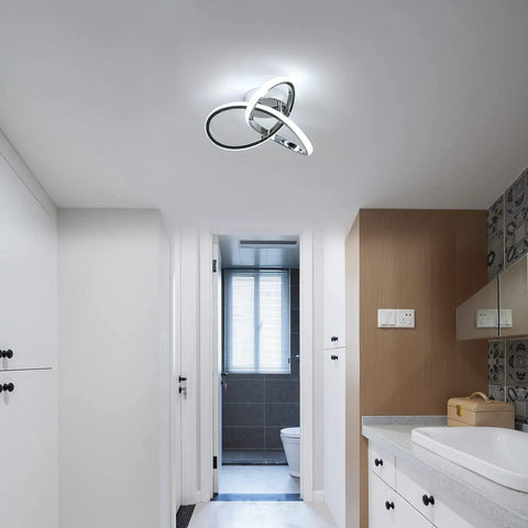 Lit Modern Ceiling Light With 6500K Cool White LED Metal Curved Design Ceiling Fixture Sleek Chrome Finish in bathroom setting