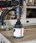 Lenox 2-3/4 in bi-metal speed-slot hole saw mounted on drill (front view)