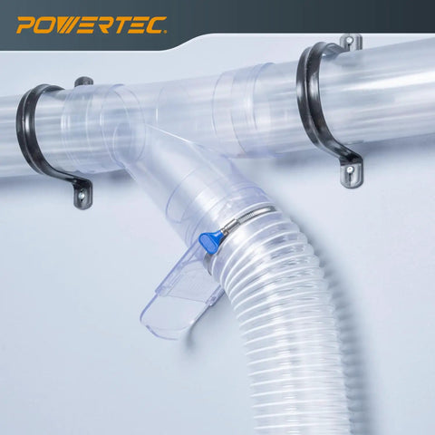 4-Inch Three-Machine Dust Collection Kit with clear plastic Y-fitting and hose clamps for DIY workshop use.