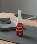 Heavy Duty Snowboard Binding Screws With Anti Loosening Locking Patches For No Sweat Mounting And Hella Solid Grip On Every Standard Disc Board You Rip This Season, with threadlocker bottle in focus.