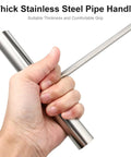Close-up of hand gripping ergonomic handle of Stainless Steel T Hook Well Cover Hook For Manholes Pro Grade Heavy Duty Lift Tool.
