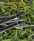 Close-up of 100 Grain Screw In Archery Field Points Set For Target Practice Arrow Tips Easy Swap Compatible With Crossbow Recurve And Compound Bow Durable Rust Resistant Steel Black Finish 8 32 Thread 100 Count.
