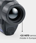 Close-up of Axion XQ30 Pro Thermal Imaging Monocular showing lens and battery release