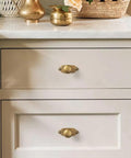 Antique Brass Zinc Alloy Cabinet Knob With Backplate Single Hole Center Mount on white kitchen drawer