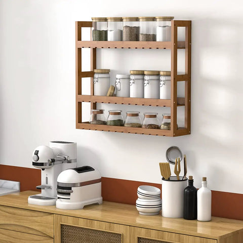 3 Tier Bamboo Wall Mount Shelf Organizer For Bathroom And Kitchen with jars, mounted over a kitchen counter, walnut finish