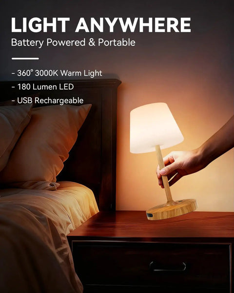 Hand placing Outdoor Waterproof Shower Lamp Cordless 5200mAh Table Lamp With Touch Dimming IP65 Wireless LED on nightstand
