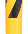 Close-up of Tough As Nails Ground Mount Heavy Duty Steel Fold Down Bollard with black safety stripes, yellow galvanized finish.