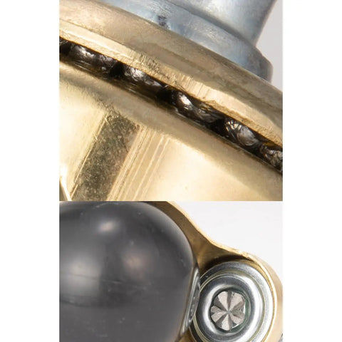 Close-up of Ready To Roll Swivel Stem Ball Caster Wheels With Vintage Antique Brass Style, showing detailed ball bearing and wheel assembly.