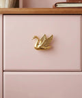 Stunning 4 Pack Swan Cabinet Knobs Featuring An Airy Flying Bird Silhouette And Exquisitely Textured Feather Detail Brings Serious French Romantic Charm To Kitchens And Closets This Set Is Literally A Game Changer Super Simple Install Zero Hassle on a pink cabinet.