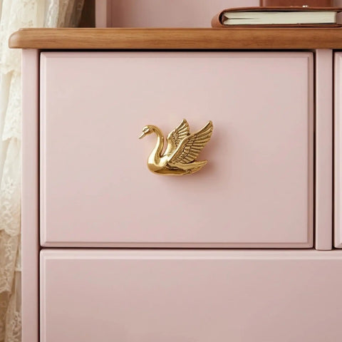 Stunning 4 Pack Swan Cabinet Knobs Featuring An Airy Flying Bird Silhouette And Exquisitely Textured Feather Detail Brings Serious French Romantic Charm To Kitchens And Closets This Set Is Literally A Game Changer Super Simple Install Zero Hassle on a pink cabinet.
