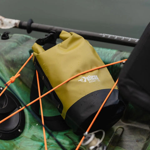 ExoDry 30L Large Drybag Waterproof With Roll Top Closure And Backpack Style Straps on a kayak deck during a fishing trip
