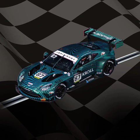 Aston Martin Vantage AMR GT3 Evo Blackthorn AMR No 87 British GT 2024 1 32 Scale Digital Slot Car on checkered track