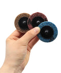 Grab These 50 Pieces Of Awesome 2 Inch Nylon Sanding Discs With 1/4 Inch Holder For Orbital Sanders To Smooth Wood, Metal And Walls Like A Boss, held in hand.