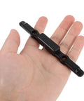 Rock Solid Luggage Pull Handle Replacement Button For Telescopic Suitcases in hand, durable black plastic for suitcase repair.