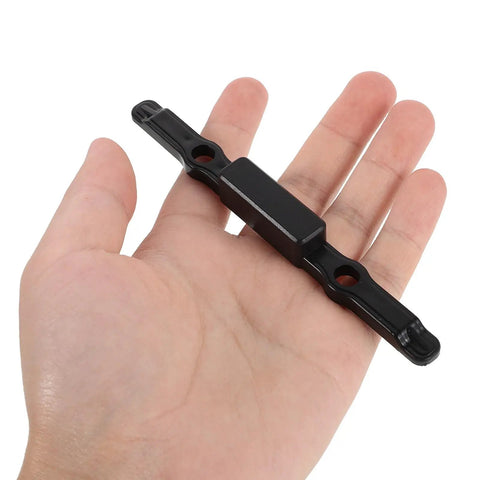 Solid Luggage Handle Button Replacement For Suitcases Black Plastic Pull Grip in hand for easy grip and suitcase repair.