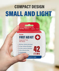 Front view of a compact white plastic first aid kit with red handle and '42 ITEMS' label.