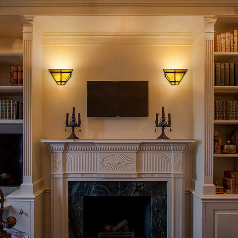 Tiffany Style 12 Inch Wide Wall Sconce Lamp With Stained Glass Mission Shade in living room above fireplace