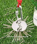 Front view of Neosmuk magnet fishing kit: round silver neodymium magnet with red rope and carabiner on grass.