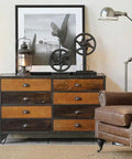 Industrial-style room with brown leather chair, vintage dresser, 4 Pack Antique Brass Cup Shell Drawer Pulls For Kitchen Cabinets, Dressers, And Wardrobes.