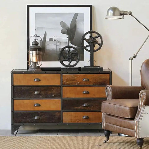 Industrial-style room with brown leather chair, vintage dresser, 4 Pack Antique Brass Cup Shell Drawer Pulls For Kitchen Cabinets, Dressers, And Wardrobes.
