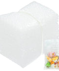 Pack Of 50 Clear 4x6 Bubble Pouches For Packing And Shipping Double Wall Cushioning Bags shown stacked with candy inside one pouch.