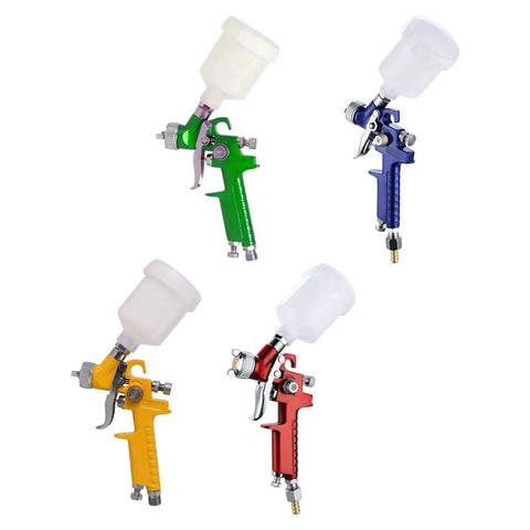 Lightweight Aluminum Pneumatic Paint Sprayer With Mixing Cup For Vehicles And Home Projects in green, yellow, red, and blue.