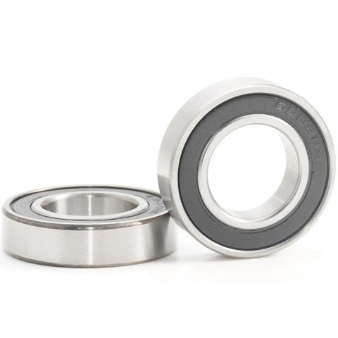 Hybrid Ceramic Bearing 15x28x7mm for Bicycle Wheel Hubs, chrome material, two bearings displayed, front and rear MTB bike hubs.