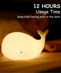 Under The Sea Nursery Night Light Whale Lamp For Baby And Toddler Room Soft Silicone Ocean Theme Nightlight shining beside sleeping child