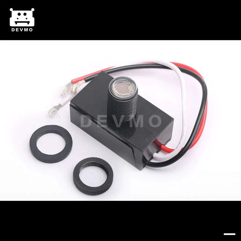 Photoelectric Dusk To Dawn Switch For Flush Mount Lights Auto On Off Photocell Module 120 Volt Fifty To Sixty Hz Four Point Two Amp Tungsten Five Hundred Watt 850 VA Ballast Five Eighth Inch Hole Mount Three Eighths Inch NPT Thread Replacement with wiring and attachments visible