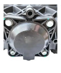 Close-up of Professional Electric Vacuum Pump For Refrigerant Recovery And Brake Bleeding showing black plastic body and connectors.