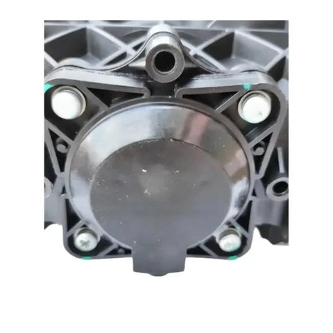 Close-up of Professional Electric Vacuum Pump For Refrigerant Recovery And Brake Bleeding showing black plastic body and connectors.