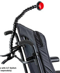 Assistive Tech Spring Clamp Kit with 24 inch flexible hose arm mounted on wheelchair with red switch, fully adjustable