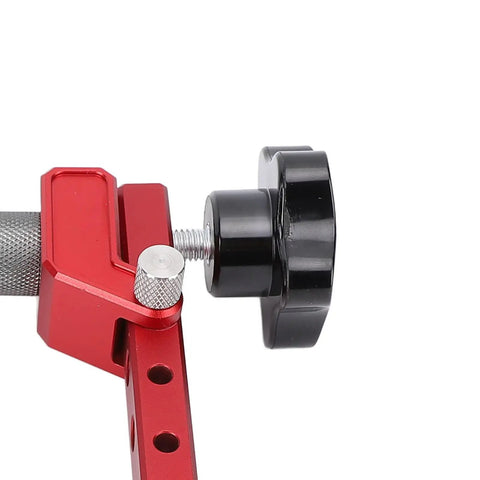 Close-up of Pro Grade 19mm Anti Scratch Bench Dog Clamp For Woodworking, aluminum build with smooth red jaws and knob