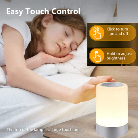 Child sleeping with Nursery Night Light For Baby With Dimmable Brightness And Easy Touch Control beside her bed.