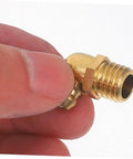 Close-up of brass 90-degree grease fitting from Grease Fittings Kit With Straight And Angled Nozzles For Automotive And Industrial Use