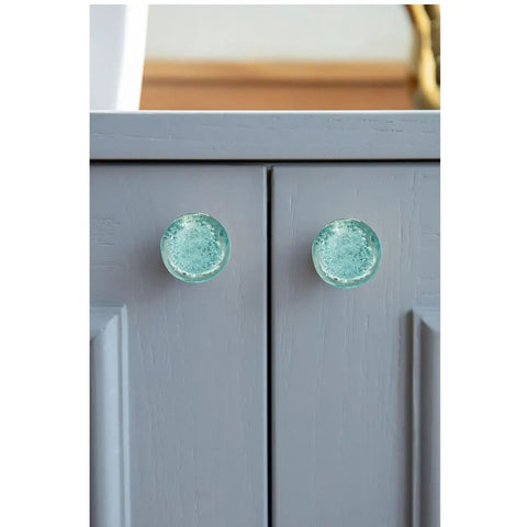 Crystal Bubble Knob Set Of 6 In Light Blue Dope Modern Glass Drawer Pulls displayed on grey cabinet doors