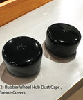 Two black rubber wheel hub dust caps, 2 inches, grease covers, set of 2