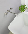 Wall Mounted Tub Filler Faucet With Two Handles, Brushed Nickel Finish, Extra Long 13 Inch Spout, Brass Rough In Valve, High Flow Roman Bathtub Faucet Set For Modern Bathrooms above a bath