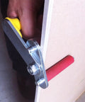 Heavy Duty Portable Drywall Lifter And Plasterboard Carrier Tool In Black Alloy With Safety Grip showing secure grip and adjustable features.