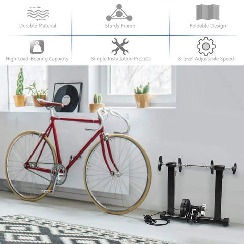 Indoor Bike Trainer Stand With Eight Level Magnetic Resistance for 26 to 28 Inch Wheels next to a red bicycle in home gym