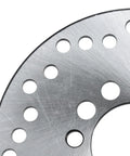 Close-up of a stainless steel rear brake disc rotor plate with holes, 160mm 6.3 inch fit for 50cc-125cc Chinese kids quad ATV go kart parts.