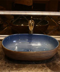USZWBY Vessel Sinks Bathroom Vessel Sink Oval Ceramic Washbasin Vintage Art Countertop Basin Utensils with Faucet Bathroom Bowl Sink on marble vanity.