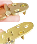 Two Pack Solid Brass Door Hinges With Concealed Flip Design For Tabletop And Furniture Includes Screws Durable Rust Resistant 80mm Long Heavy Duty Construction Smooth Edges Resistant To Scratches, close-up of hinge detail with screws