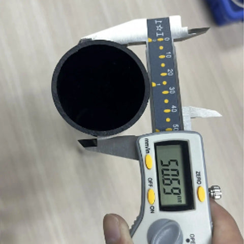 Heavy Duty Black PVC Rigid Tube 2 Inch Round Pipe measured at 50.89mm diameter for wiring and plumbing jobs.