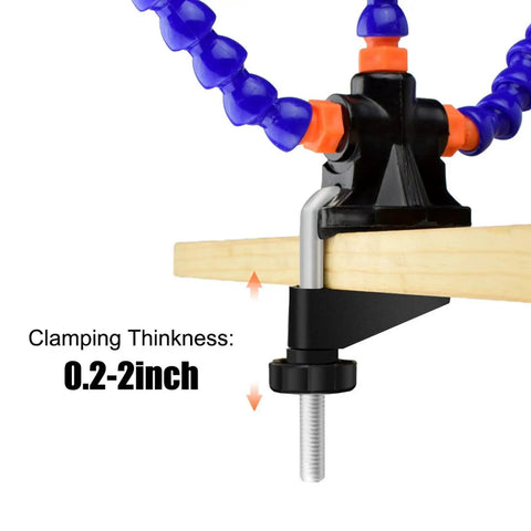 No Sweat Hella Solid Third Hand Soldering Helper With Four Bendable Upright Arms attached to wood with adjustable clamp.