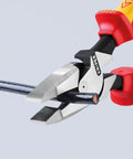 Beefy High Leverage Lineman's Pliers With New England Head 1000V Insulated Dual-Component Grips squeezing a wire