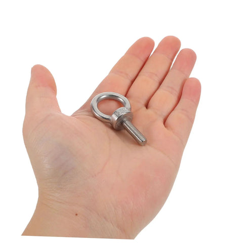 Stainless Steel Eye Bolt M6x20 With Closed Ring And Hole Built For Tough As Nails Lifts And Secure Rigging Anti Loosening Nylon Nut Kit With Flat And Spring Washers For Machinery And Hook Applications, shown in hand